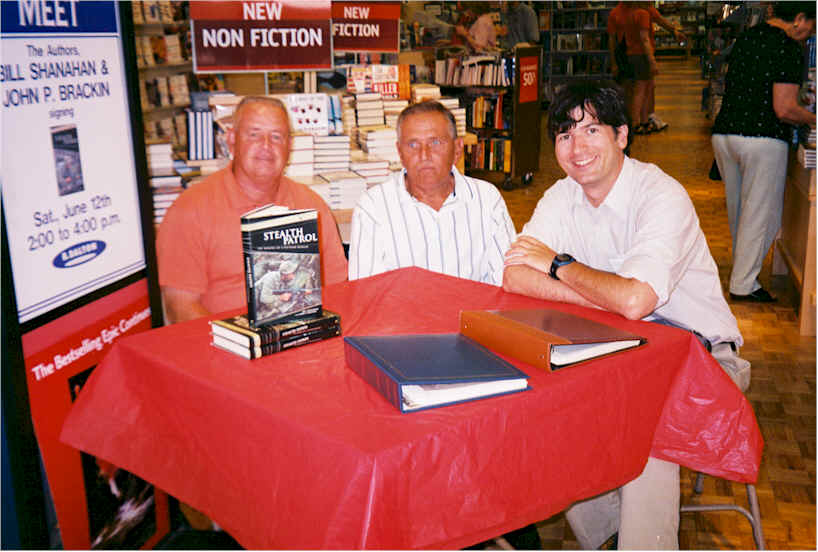 At B. Dalton Books. Saturday, June 12, 2004. With Dave Brueggemann in the center. (Just 3 books left!)